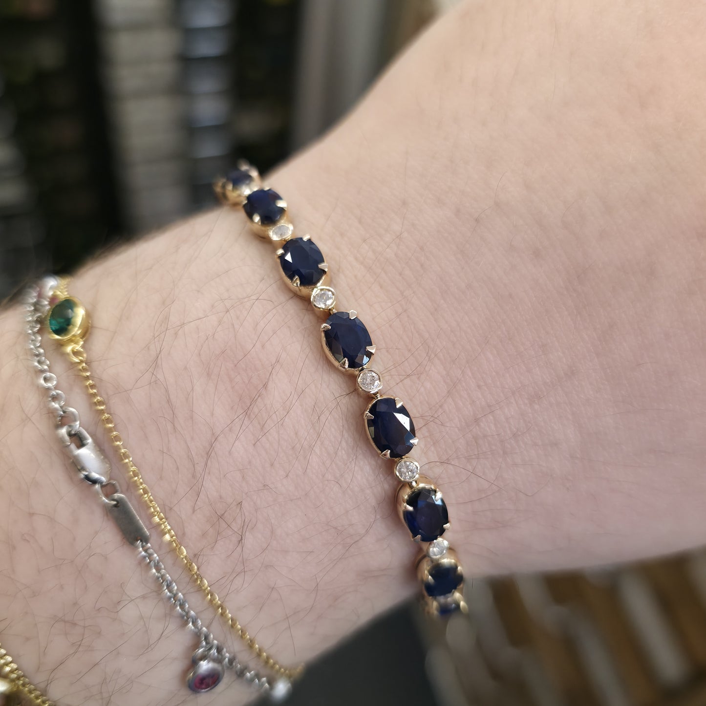 18ct Yellow Gold Oval Cut Sapphire And Small Round Cut Diamond Tennis Bracelet
