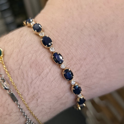 18ct Yellow Gold Oval Cut Sapphire And Small Round Cut Diamond Tennis Bracelet