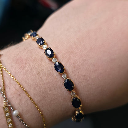 18ct Yellow Gold Oval Cut Sapphire And Small Round Cut Diamond Tennis Bracelet