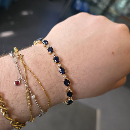 18ct Yellow Gold Oval Cut Sapphire And Small Round Cut Diamond Tennis Bracelet