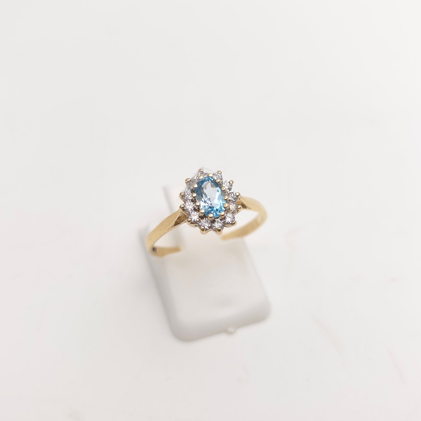 9ct Yellow Gold Small Blue Topaz And White Stone Oval Cluster Ring