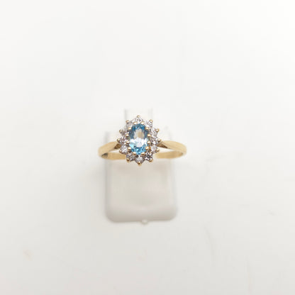 9ct Yellow Gold Small Blue Topaz And White Stone Oval Cluster Ring