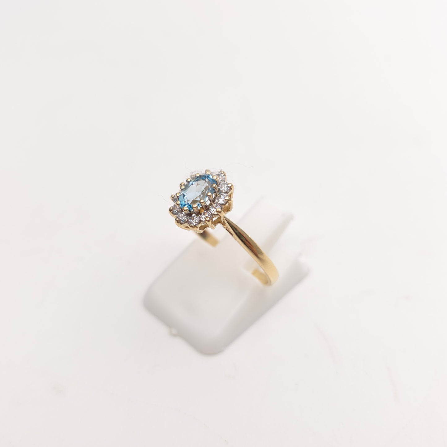 9ct Yellow Gold Small Blue Topaz And White Stone Oval Cluster Ring
