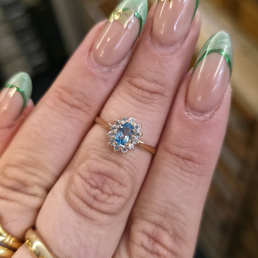9ct Yellow Gold Small Blue Topaz And White Stone Oval Cluster Ring