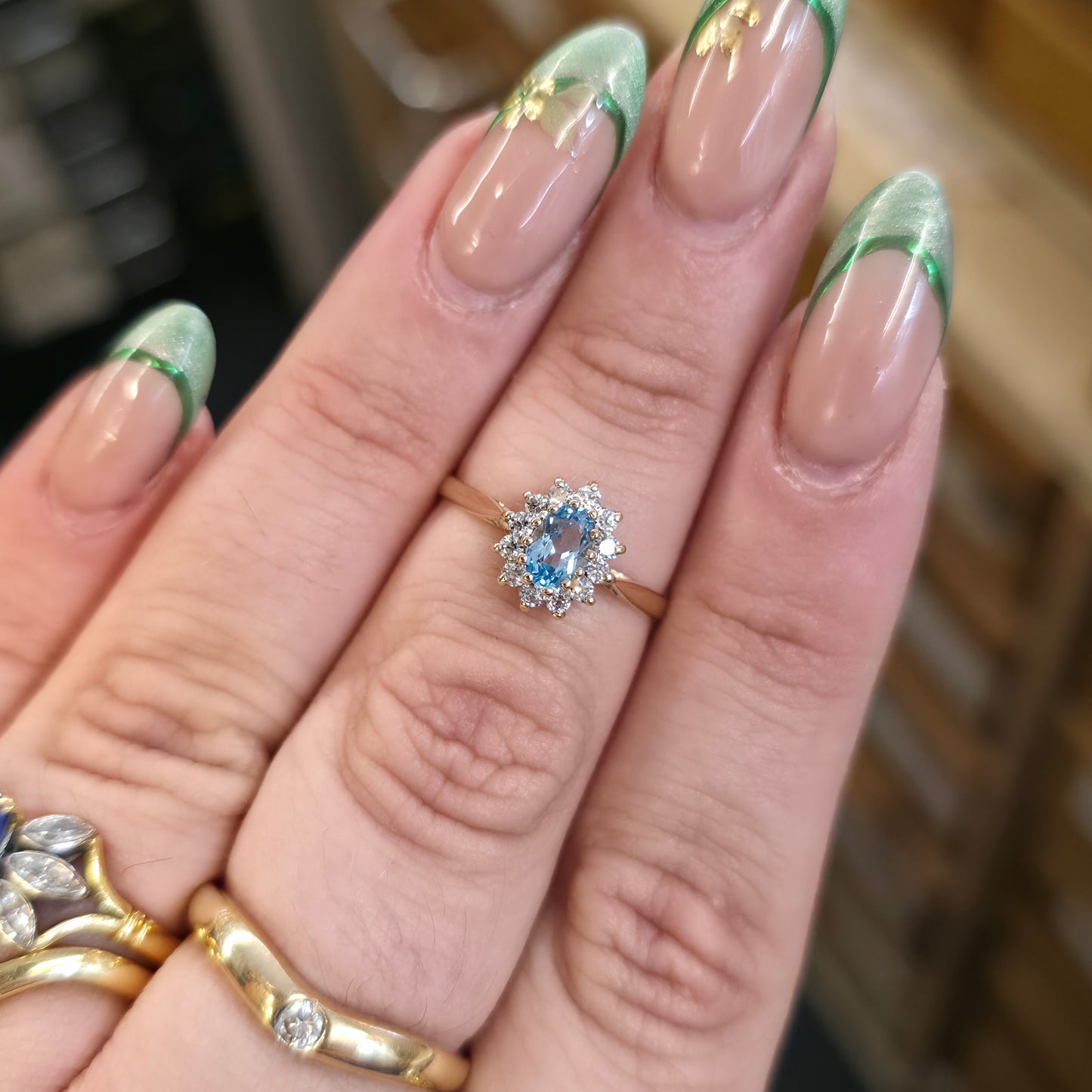9ct Yellow Gold Small Blue Topaz And White Stone Oval Cluster Ring