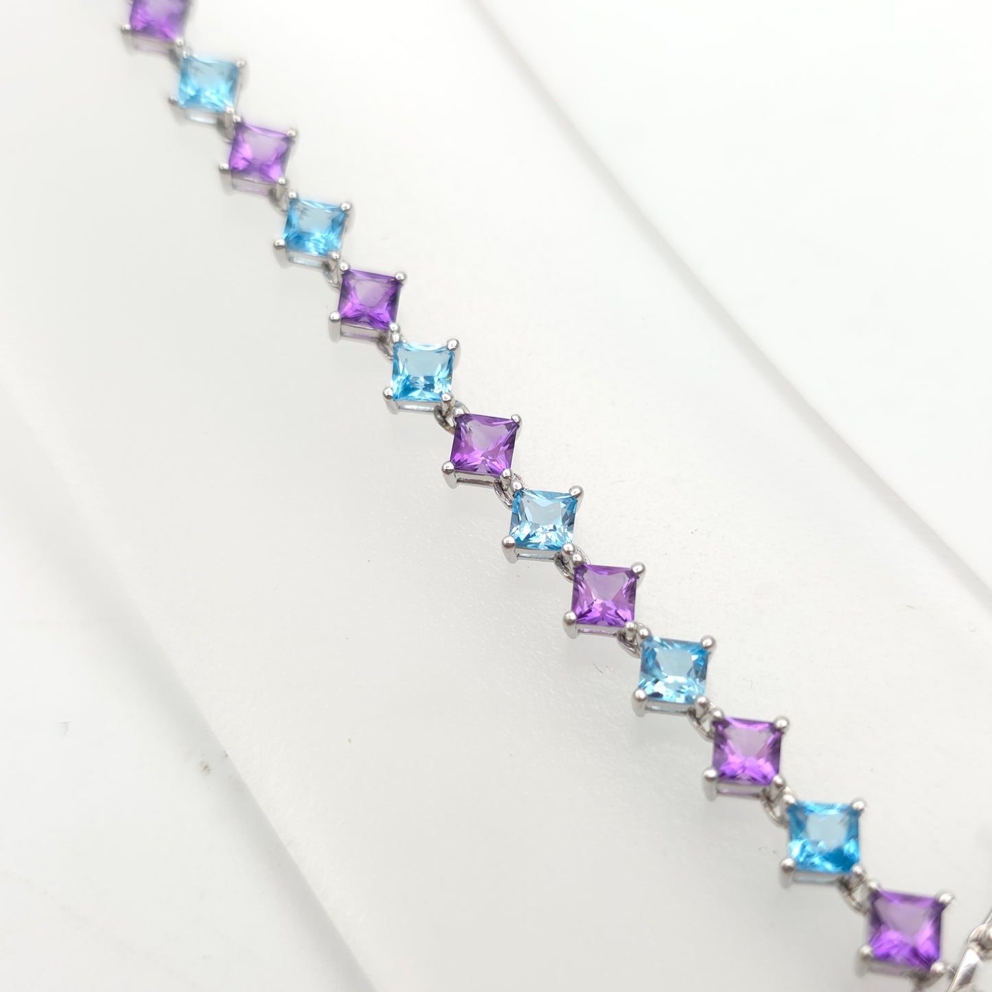 9ct White Gold Princess Cut Blue Topaz And Amethyst Tennis Stone Set Bracelet