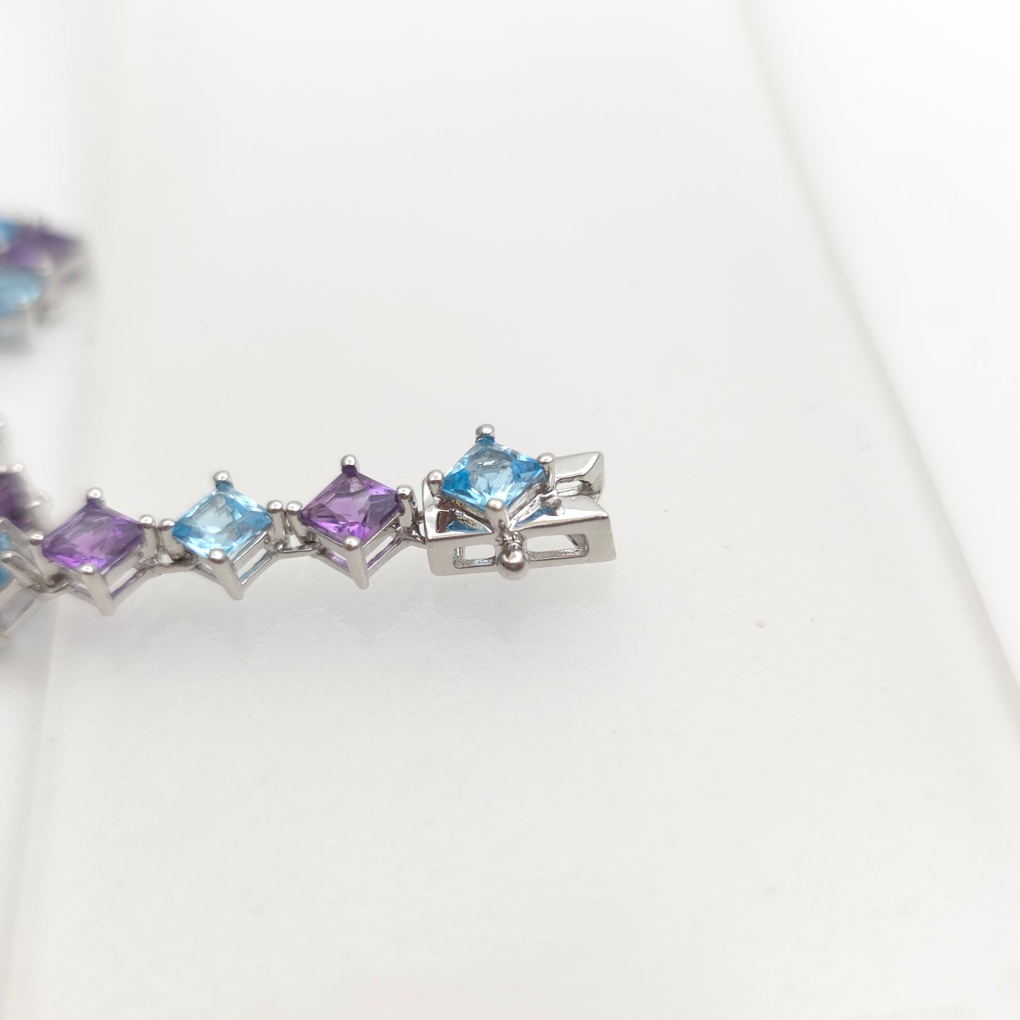 9ct White Gold Princess Cut Blue Topaz And Amethyst Tennis Stone Set Bracelet