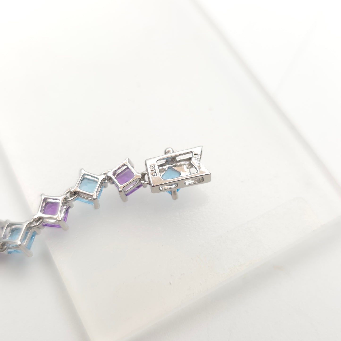 9ct White Gold Princess Cut Blue Topaz And Amethyst Tennis Stone Set Bracelet