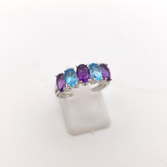 9ct White Gold Oval Cut Blue Topaz And Amethyst Half Eternity Row Ring