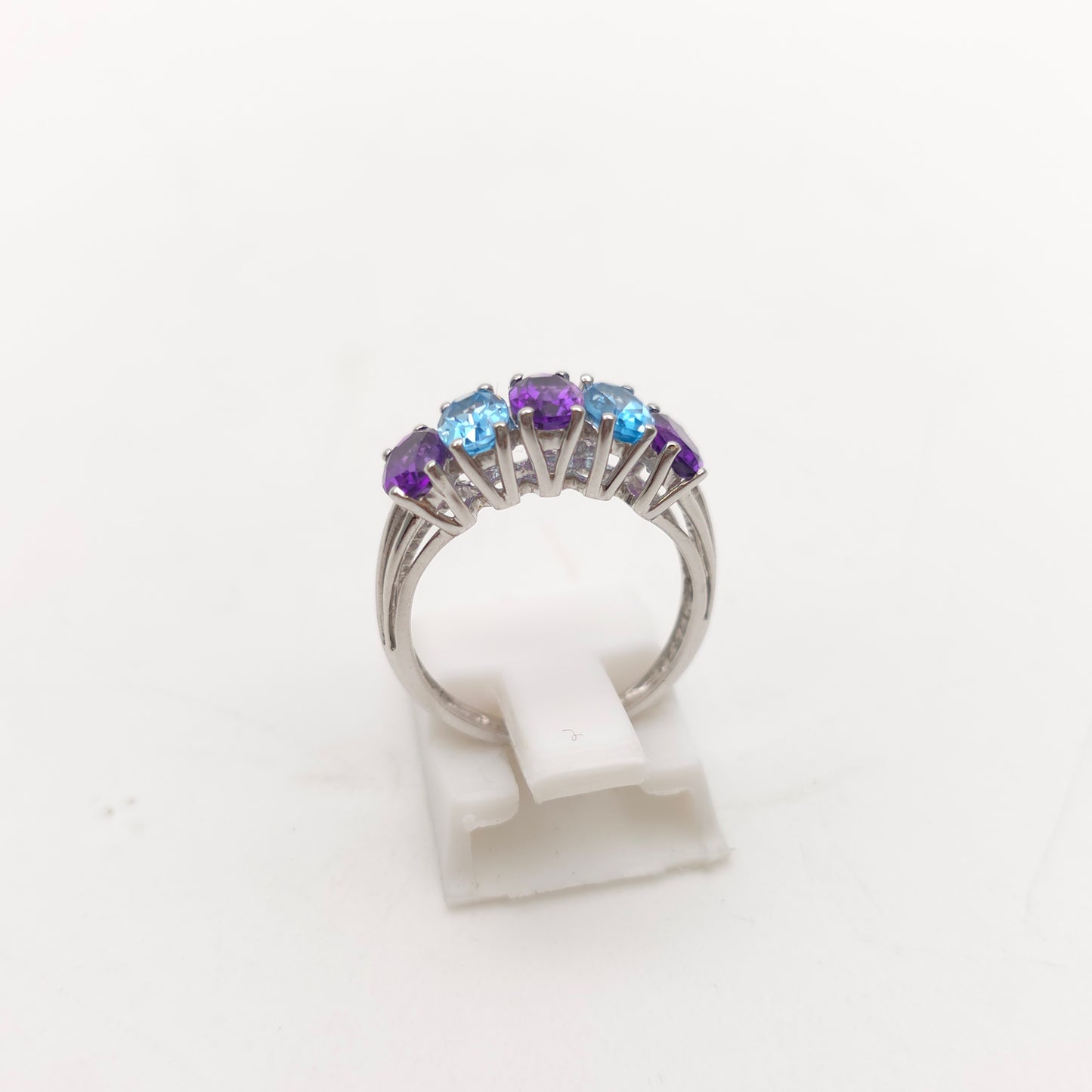 9ct White Gold Oval Cut Blue Topaz And Amethyst Half Eternity Row Ring