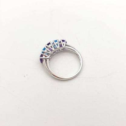 9ct White Gold Oval Cut Blue Topaz And Amethyst Half Eternity Row Ring