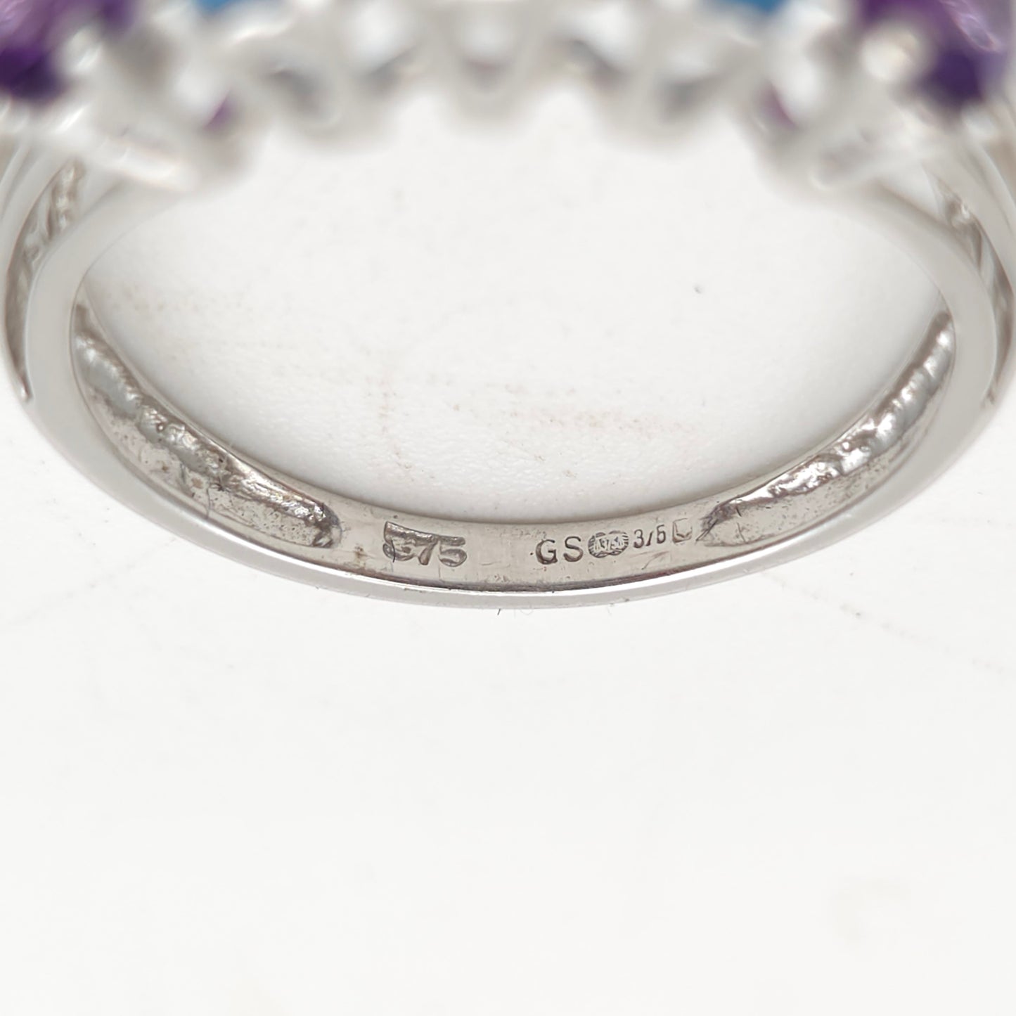 9ct White Gold Oval Cut Blue Topaz And Amethyst Half Eternity Row Ring