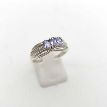 Sterling Silver Oval Cut Tanzanite Trilogy And Diamond Set Shoulders Ring