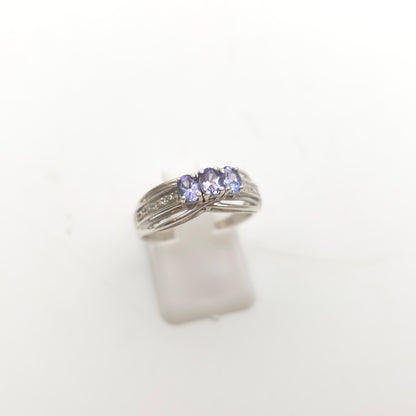Sterling Silver Oval Cut Tanzanite Trilogy And Diamond Set Shoulders Ring