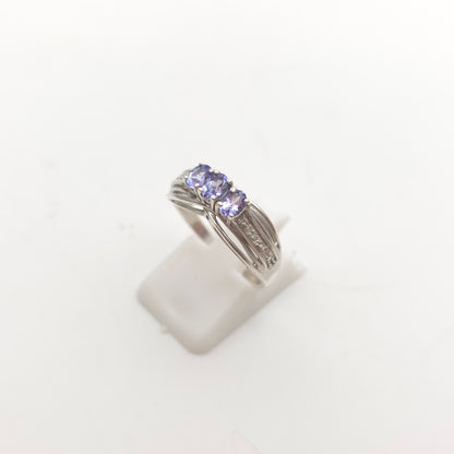 Sterling Silver Oval Cut Tanzanite Trilogy And Diamond Set Shoulders Ring