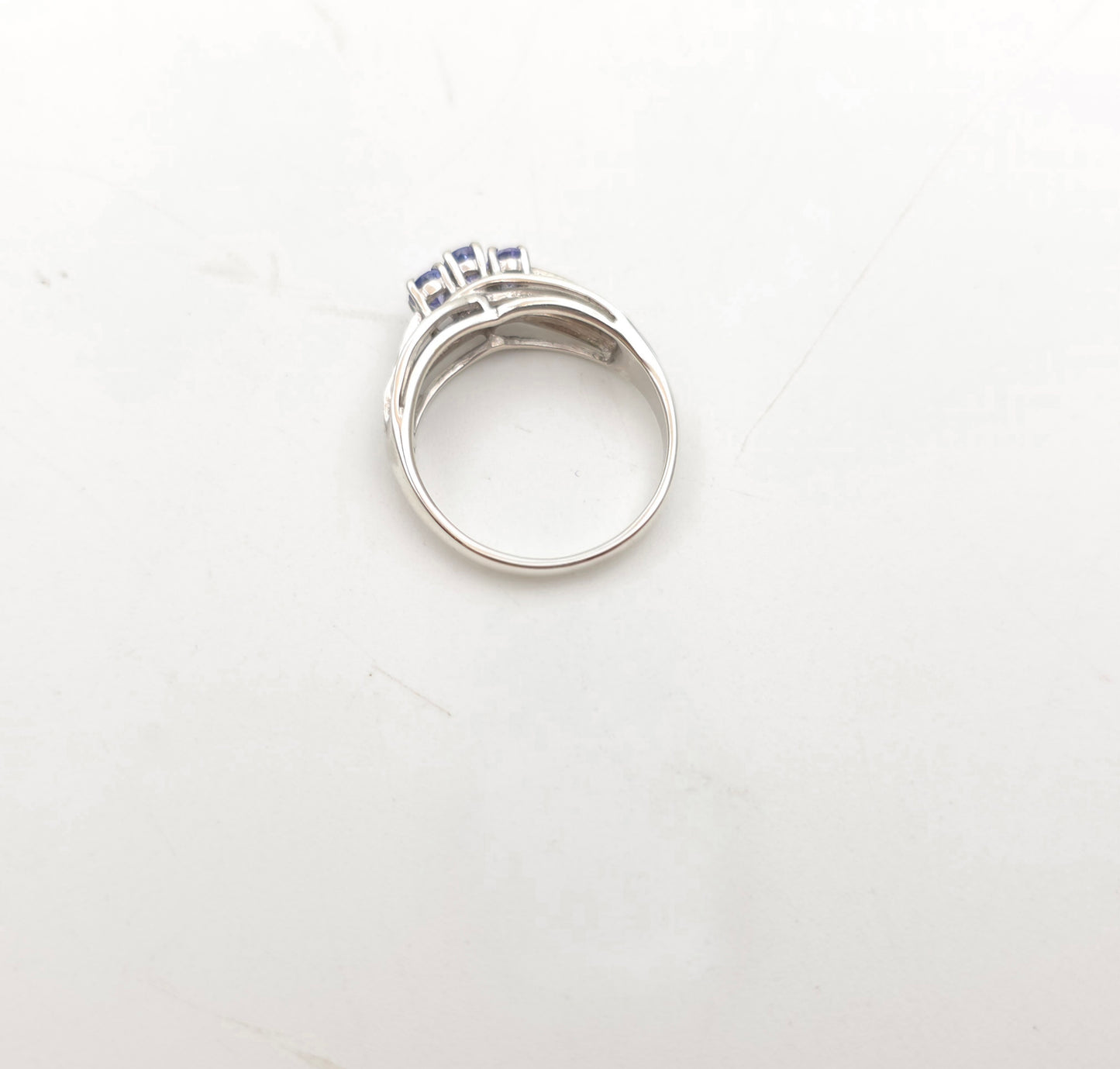 Sterling Silver Oval Cut Tanzanite Trilogy And Diamond Set Shoulders Ring
