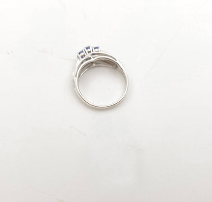 Sterling Silver Oval Cut Tanzanite Trilogy And Diamond Set Shoulders Ring
