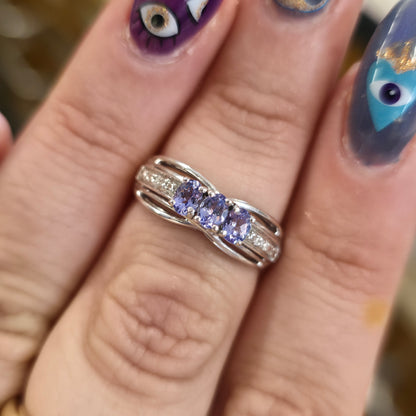 Sterling Silver Oval Cut Tanzanite Trilogy And Diamond Set Shoulders Ring