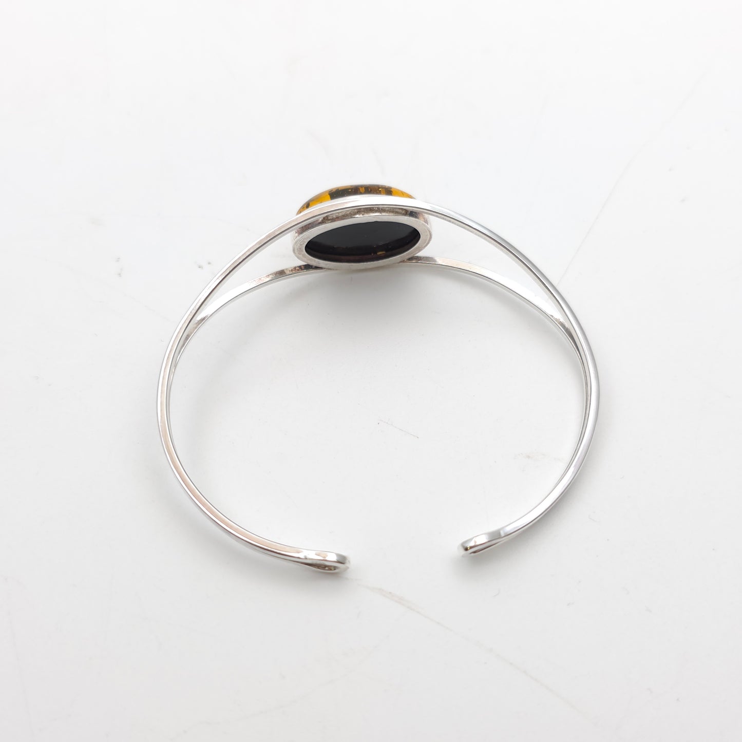 Sterling Silver Large Oval Amber Cabochon Set Openwork Bangle
