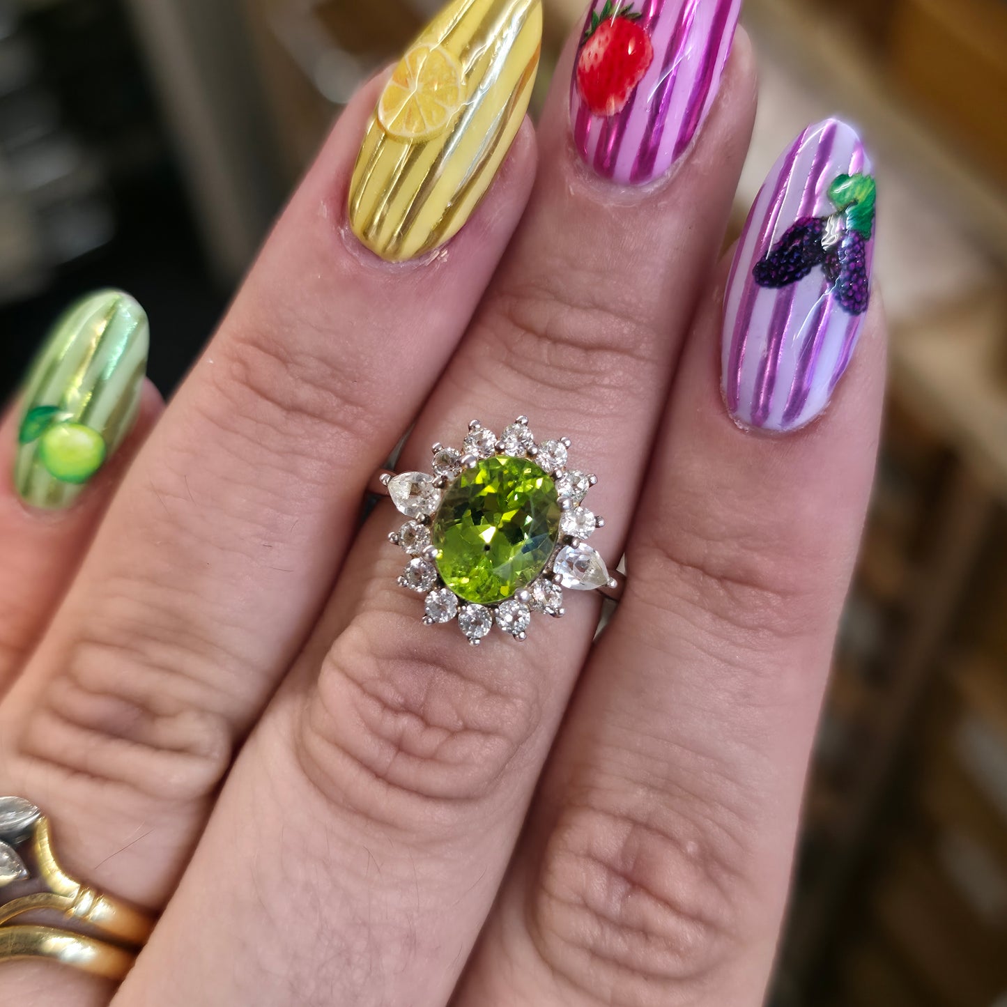 Sterling Silver Large Oval Cut Peridot And White Stone Cluster Ring