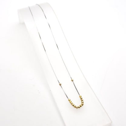 18ct White Gold And Yellow Gold Faceted Free Moving Beaded Necklace 16"