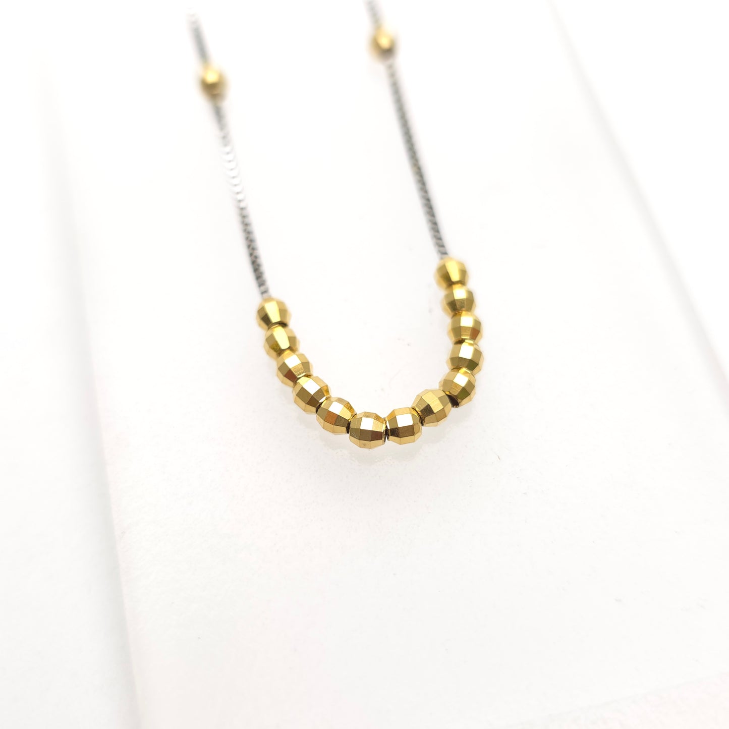 18ct White Gold And Yellow Gold Faceted Free Moving Beaded Necklace 16"