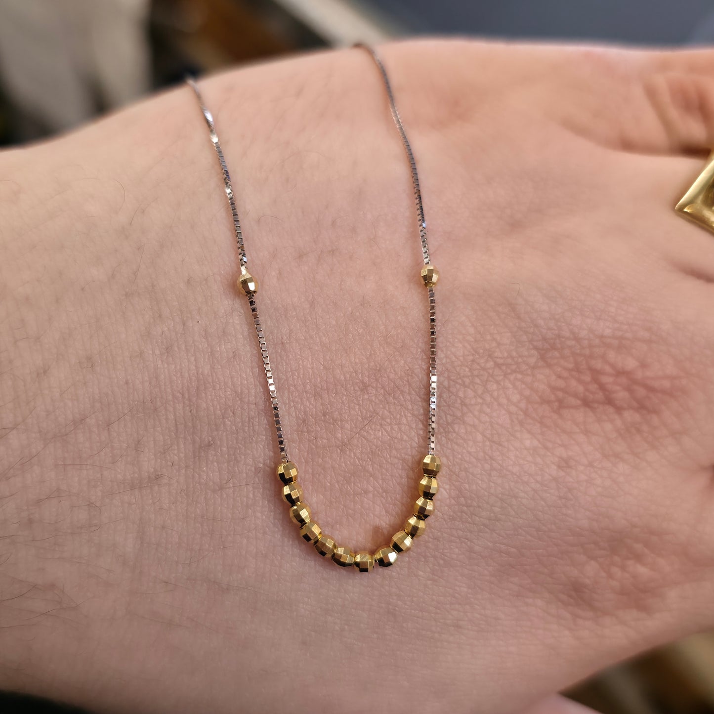 18ct White Gold And Yellow Gold Faceted Free Moving Beaded Necklace 16"