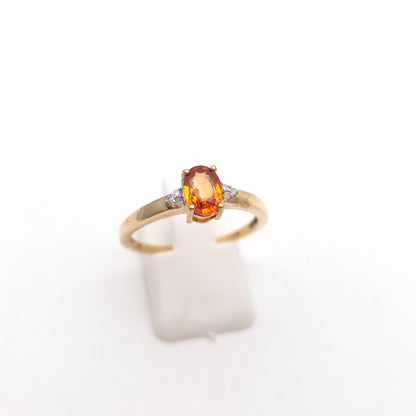 9ct Yellow Gold Oval Cut Orange Sapphire And Diamond Set Shoulder Ring