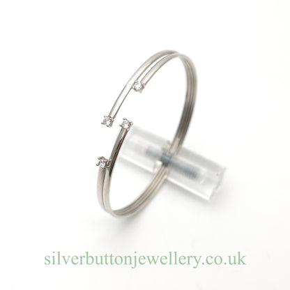 9ct White Gold Open Four Row White Stone Set Bangle