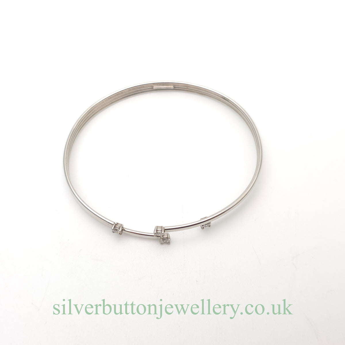 9ct White Gold Open Four Row White Stone Set Bangle