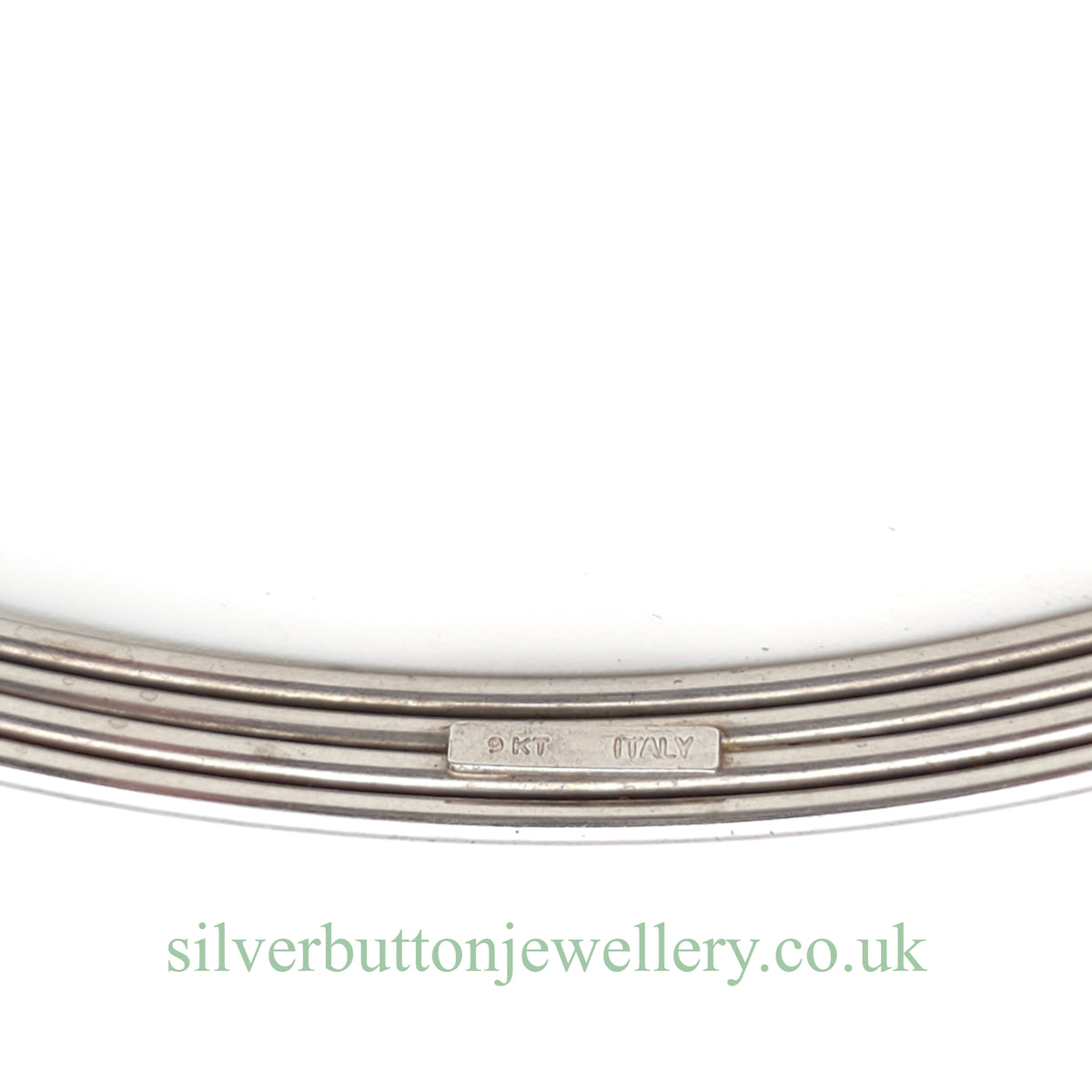 9ct White Gold Open Four Row White Stone Set Bangle