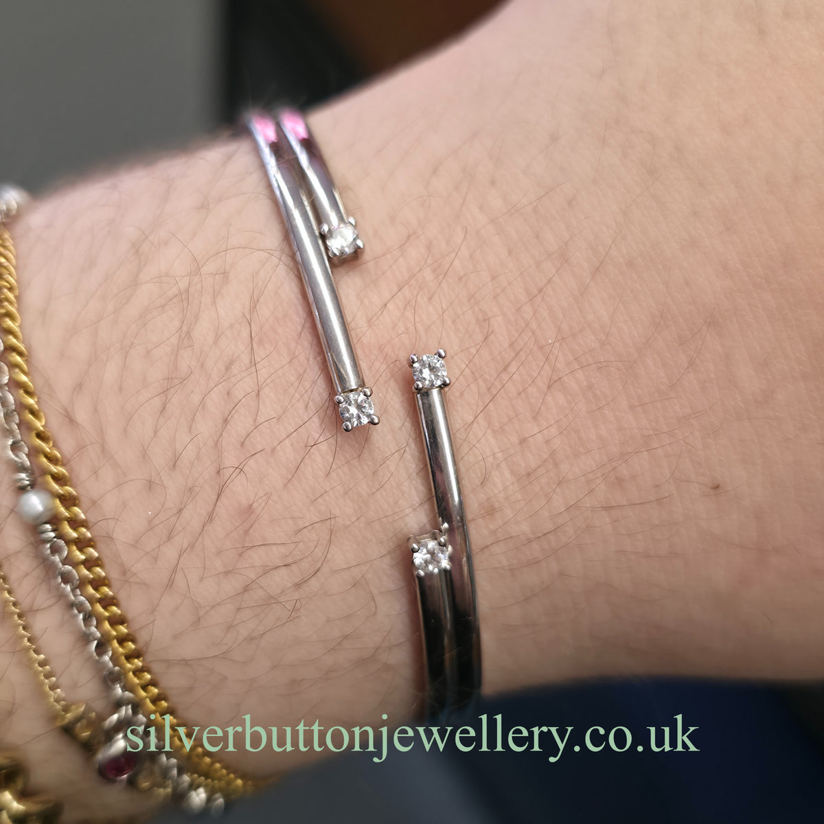 9ct White Gold Open Four Row White Stone Set Bangle