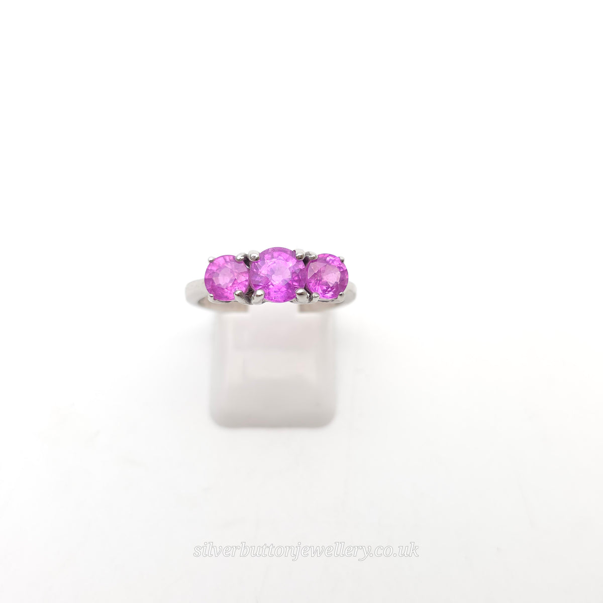 Sterling Silver Round Cut Pink Sapphire Three Stone Trilogy Ring