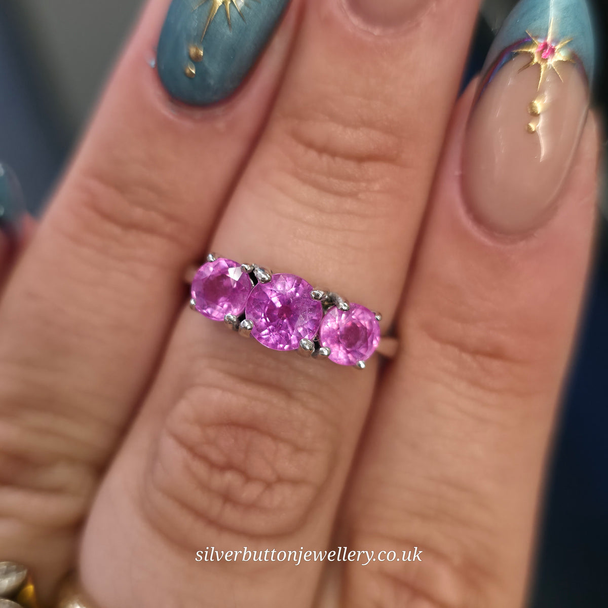Sterling Silver Round Cut Pink Sapphire Three Stone Trilogy Ring