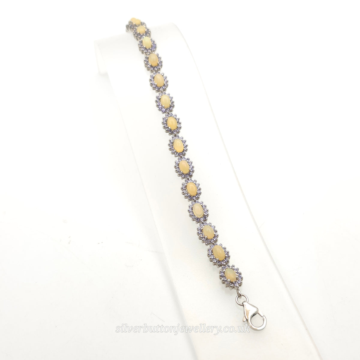 Sterling Silver Oval Cabochon Opal And Round Cut Tanzanite Cluster Bracelet