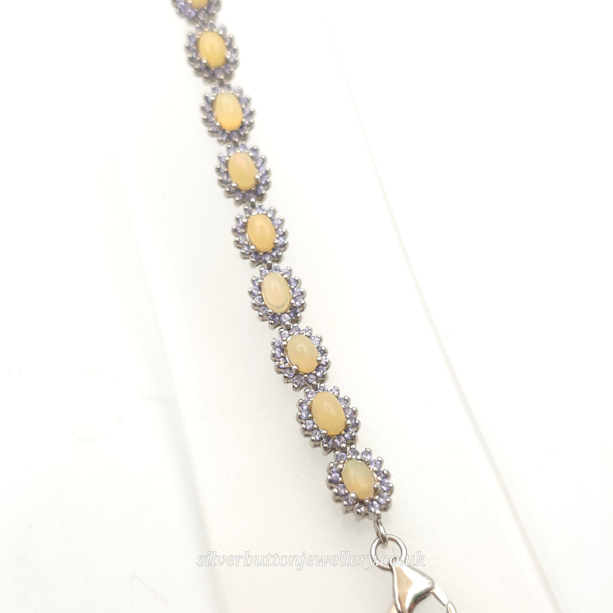 Sterling Silver Oval Cabochon Opal And Round Cut Tanzanite Cluster Bracelet