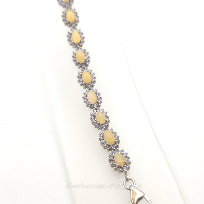 Sterling Silver Oval Cabochon Opal And Round Cut Tanzanite Cluster Bracelet