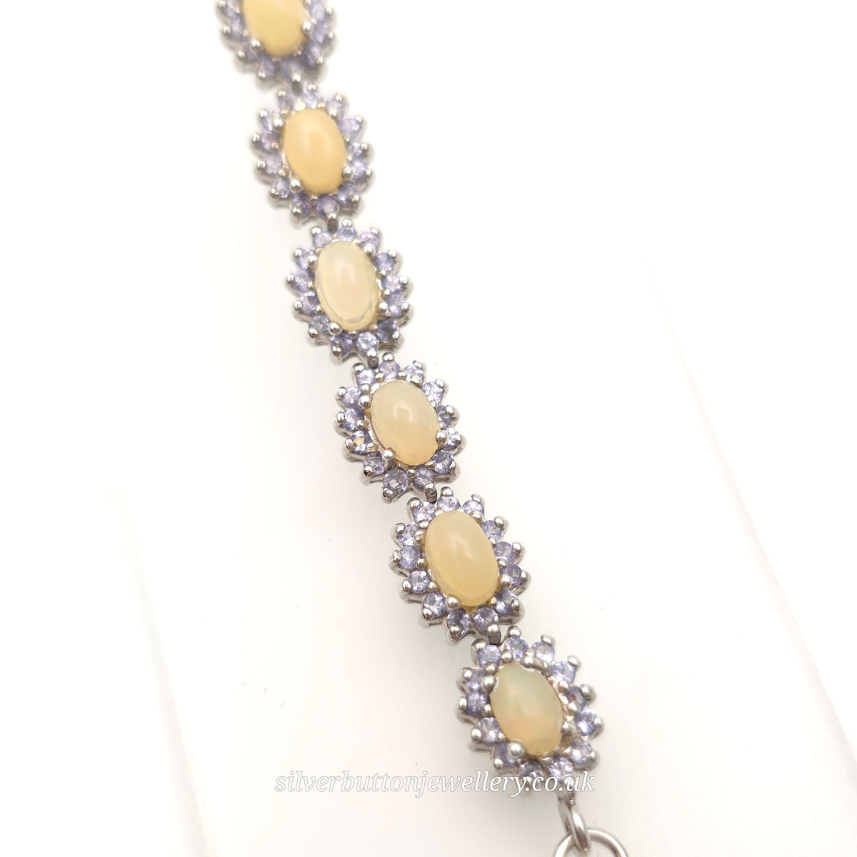 Sterling Silver Oval Cabochon Opal And Round Cut Tanzanite Cluster Bracelet