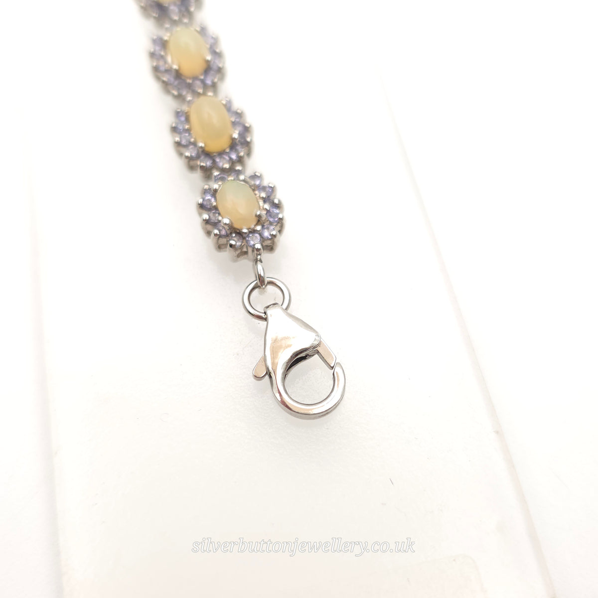 Sterling Silver Oval Cabochon Opal And Round Cut Tanzanite Cluster Bracelet