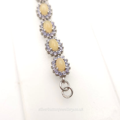 Sterling Silver Oval Cabochon Opal And Round Cut Tanzanite Cluster Bracelet