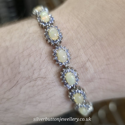 Sterling Silver Oval Cabochon Opal And Round Cut Tanzanite Cluster Bracelet