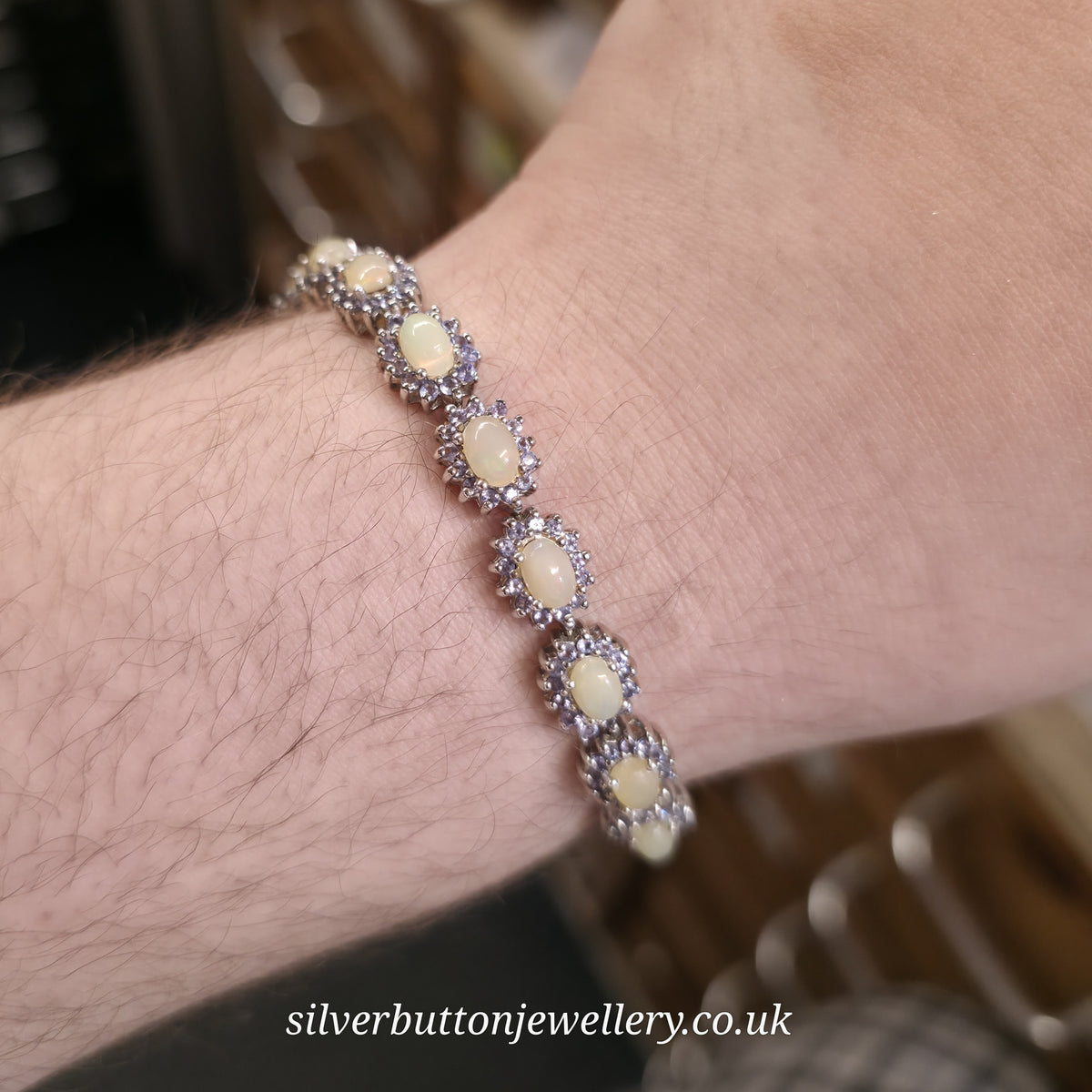 Sterling Silver Oval Cabochon Opal And Round Cut Tanzanite Cluster Bracelet