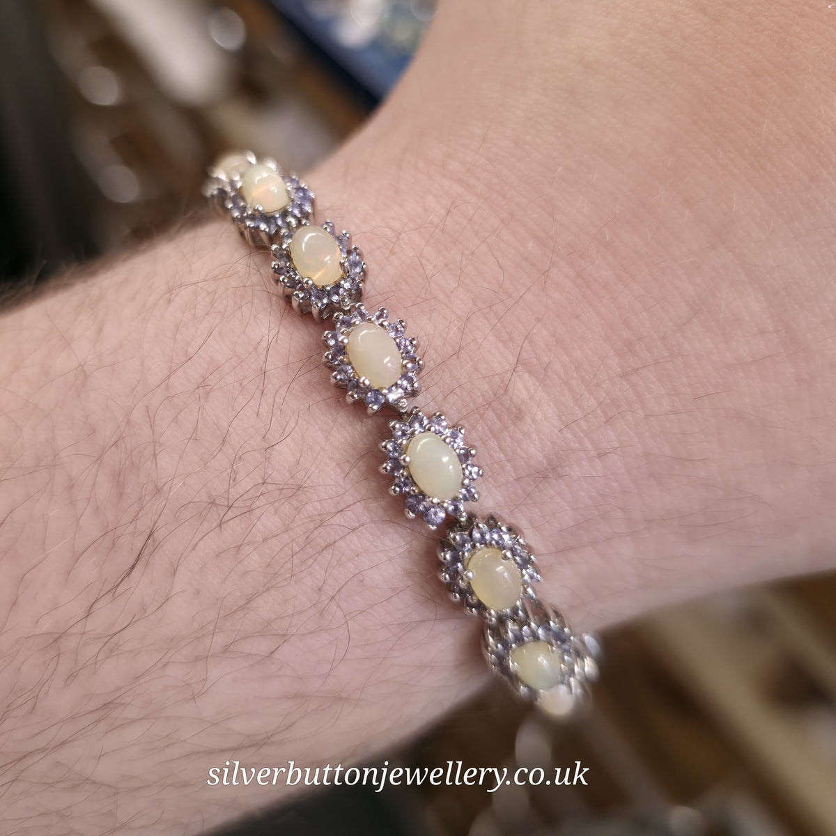 Sterling Silver Oval Cabochon Opal And Round Cut Tanzanite Cluster Bracelet