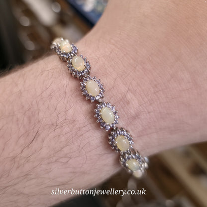 Sterling Silver Oval Cabochon Opal And Round Cut Tanzanite Cluster Bracelet