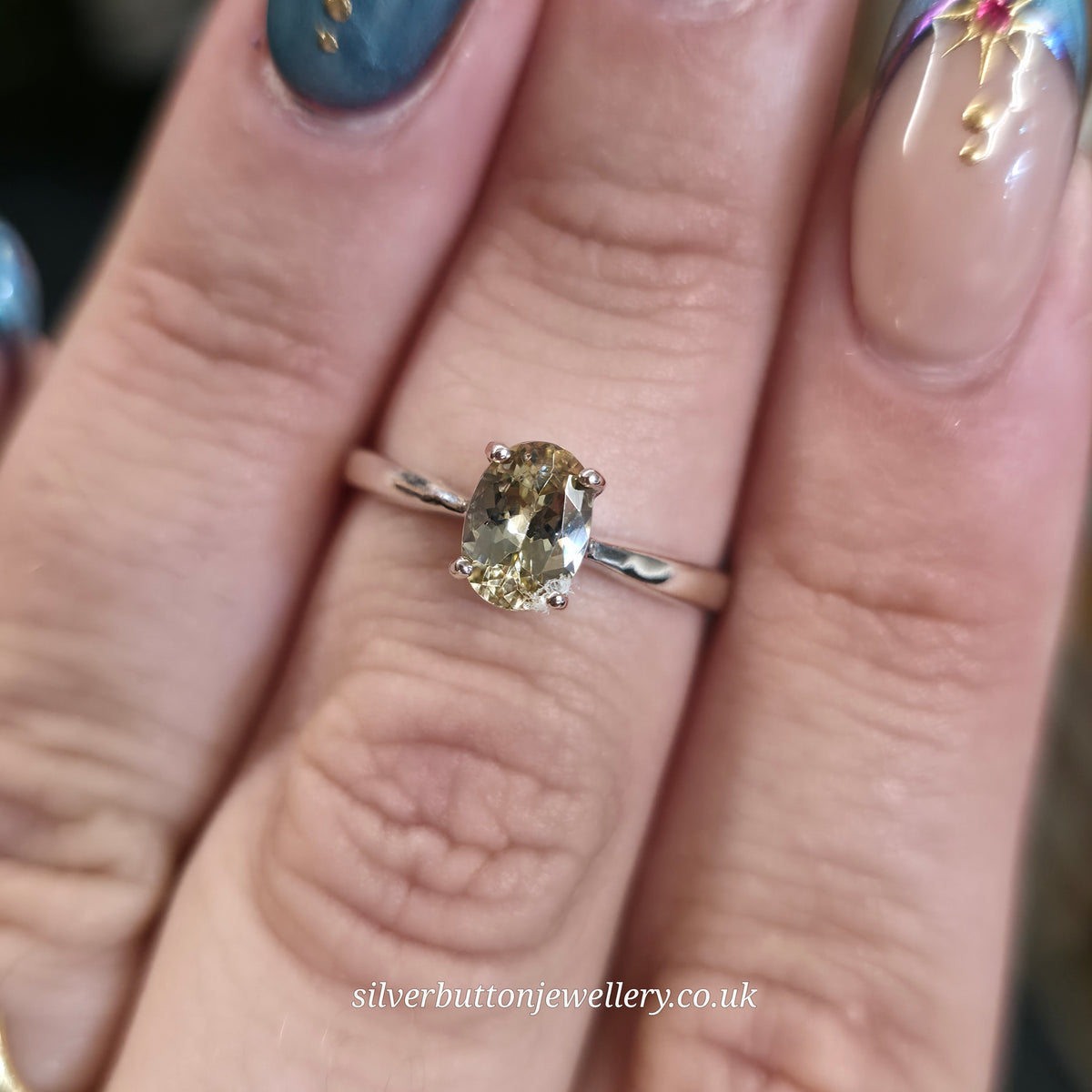 9ct White Gold Classic Oval Cut Sphene Solitaire Ring