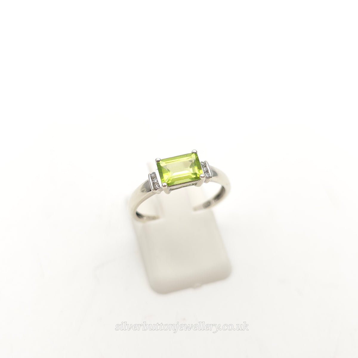 9ct White Gold East-West Set Emerald Cut Peridot And Diamond Ring