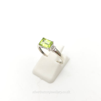 9ct White Gold East-West Set Emerald Cut Peridot And Diamond Ring