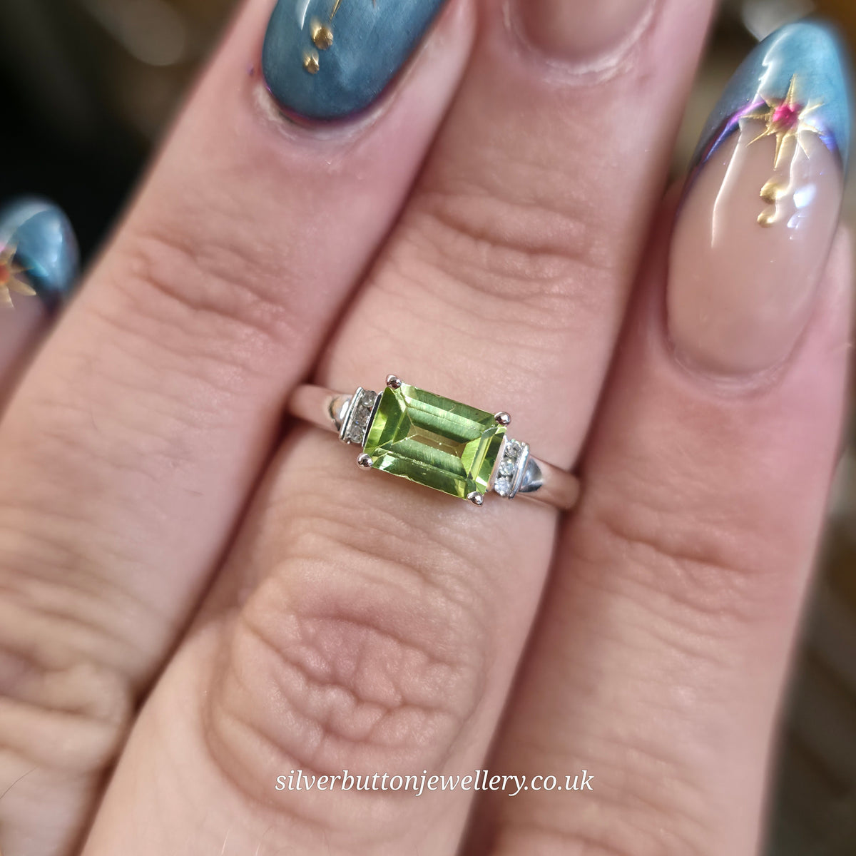 9ct White Gold East-West Set Emerald Cut Peridot And Diamond Ring