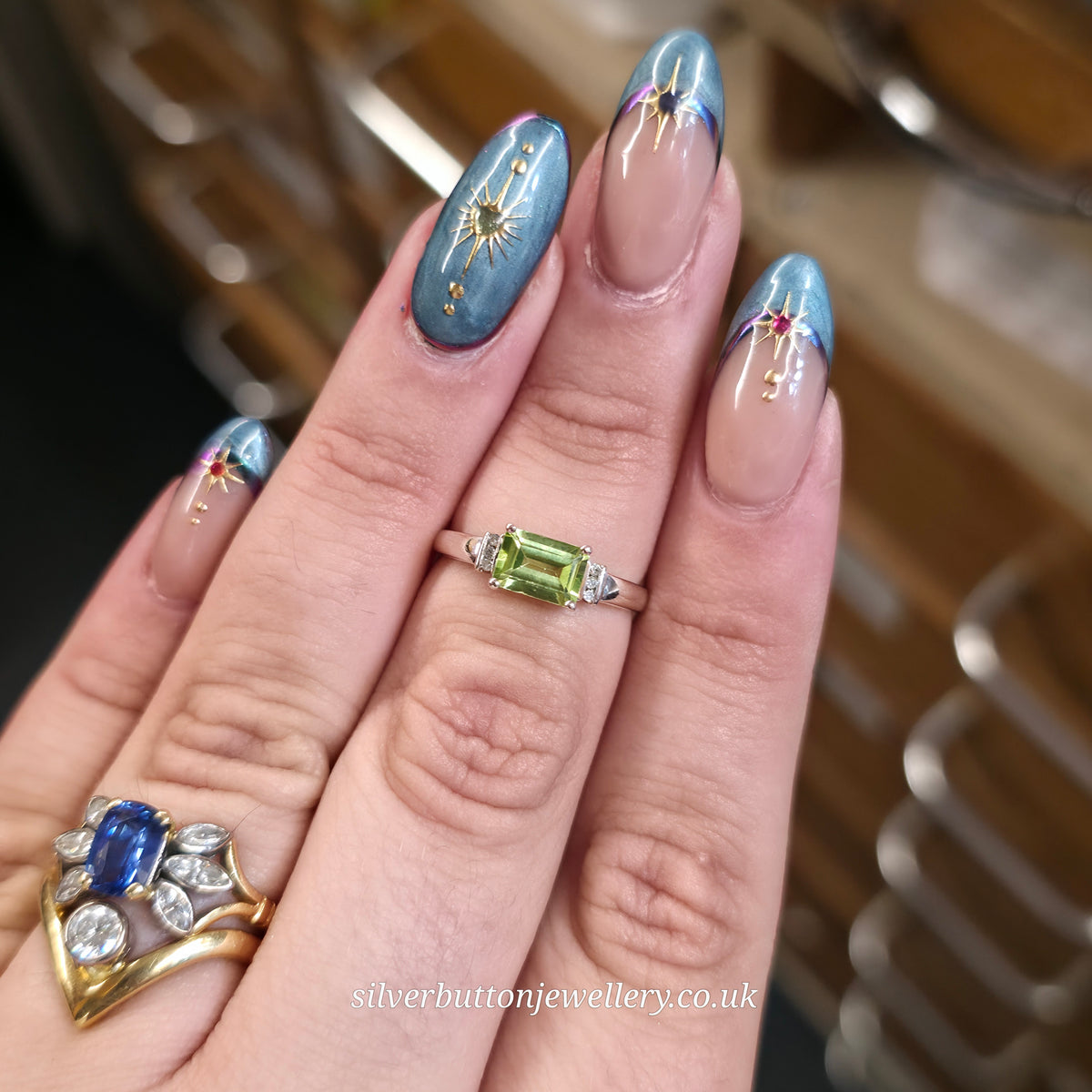 9ct White Gold East-West Set Emerald Cut Peridot And Diamond Ring
