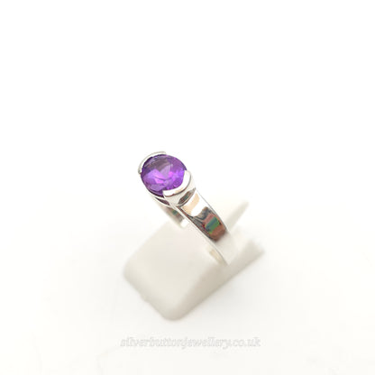 Sterling Silver Oval Cut East West Half Bezel Set Amethyst Solitaire Ring